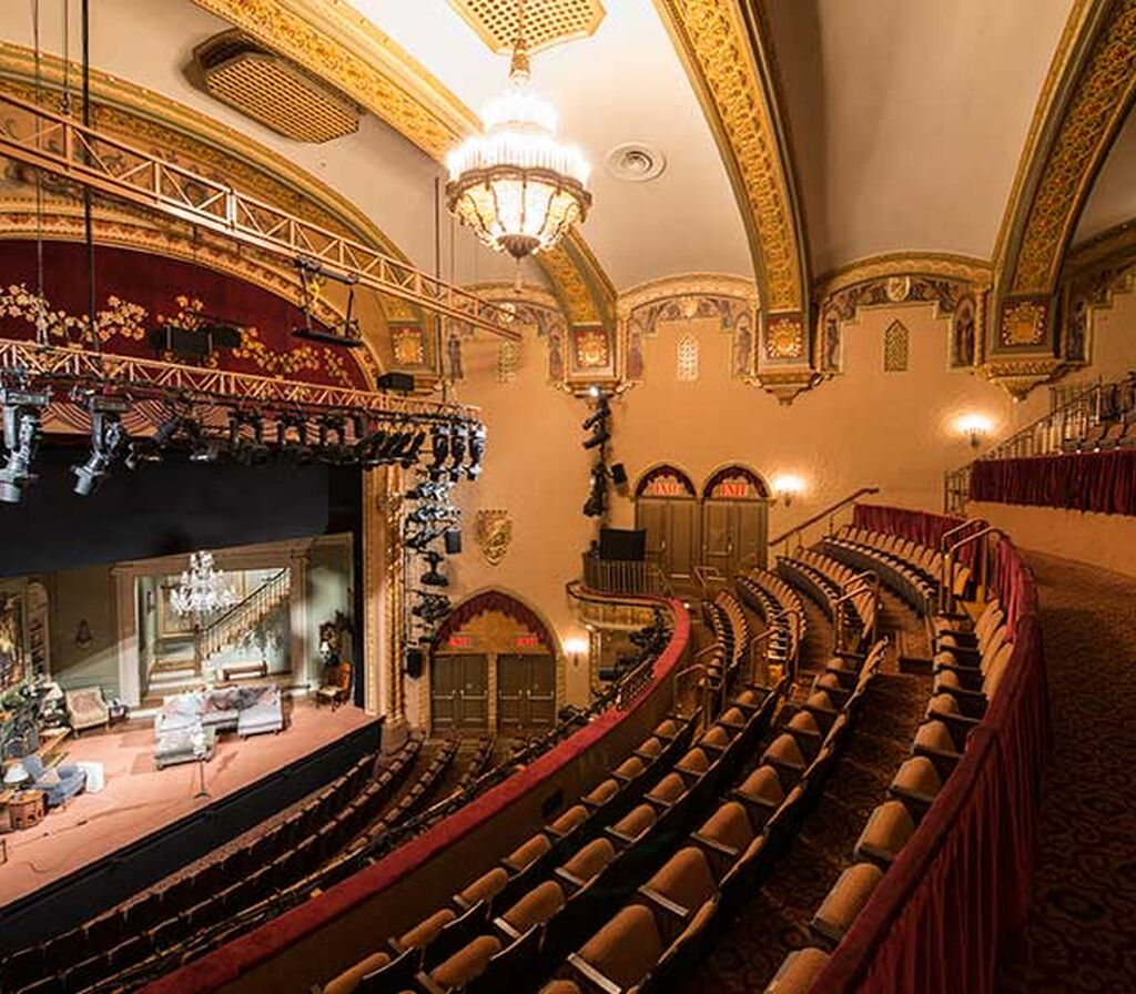 Golden theatre with custom Oriental historic theater chairs ...